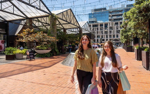 Two girls enjoying shopping at Britomart in Auckland, New Zealand
