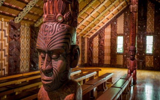 A traditional Māori carving in Te Whare Rūnanga in Northland, New Zealand