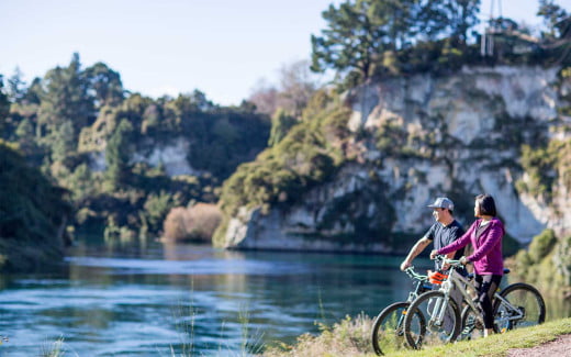 Biking along the Great Lake Pathway in Taupo, New Zealand