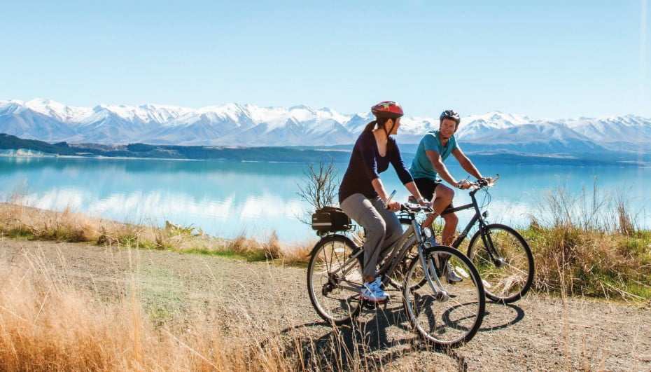 Bike riding along Lake Pukaki, McKenzie Region, New Zealand.