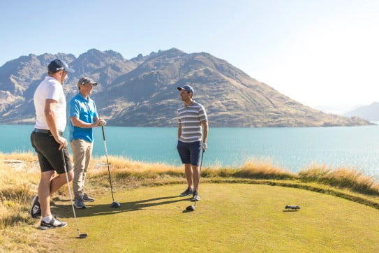 Friends golfing at Jacks Point, Queenstown, New Zealand.