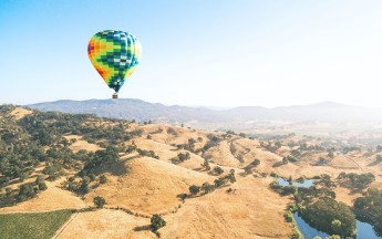 A hot air balloon flying over Napa Valley in San Francisco