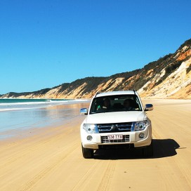 4WD down Rainbow Beach, Sunshine Coast, Australia. 