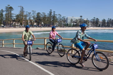 Cycling at Manly Beach, Sydney, Australia. 