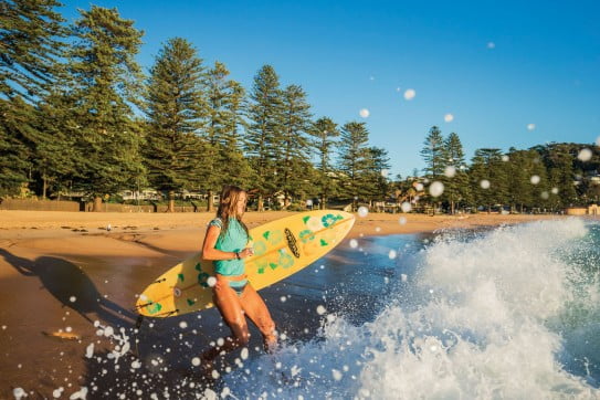 Surfer at Palm Beach, Sydney, Australia.