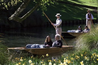 Couples punting on the beautiful Avon river in Christchurch, New Zealand.