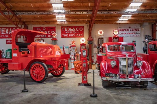 Red classic truck and red car, Transport World, Invercargill. 
