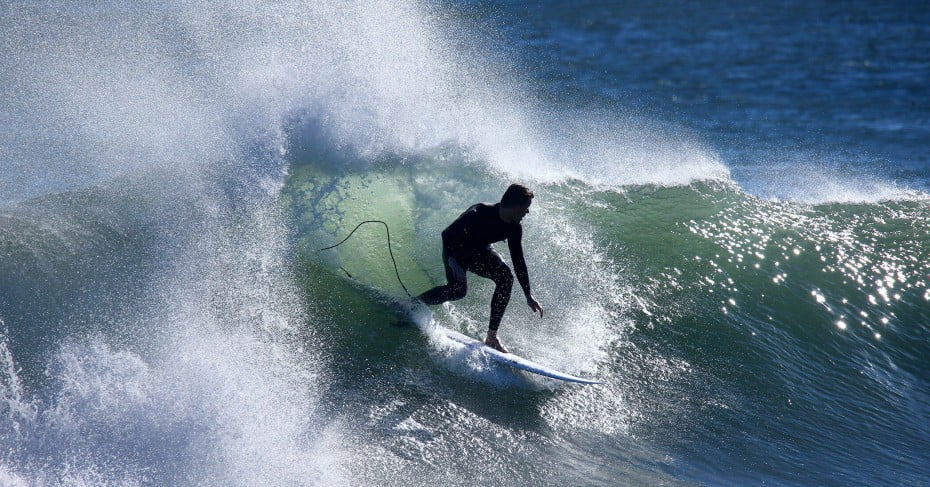 Surfer at Rocky Point, Surf Highway 45, Taranaki/New Plymouth, New Zealand. 
