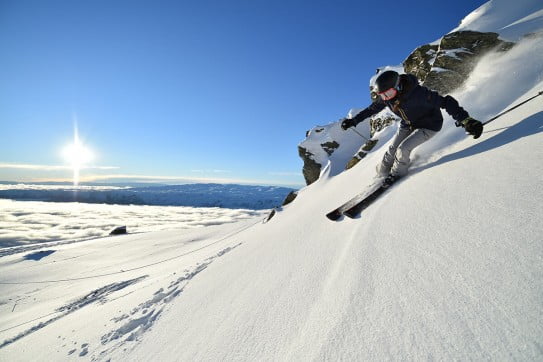 Woman skiing, Cardrona Alpine Resort, Queenstown, New Zealand. 