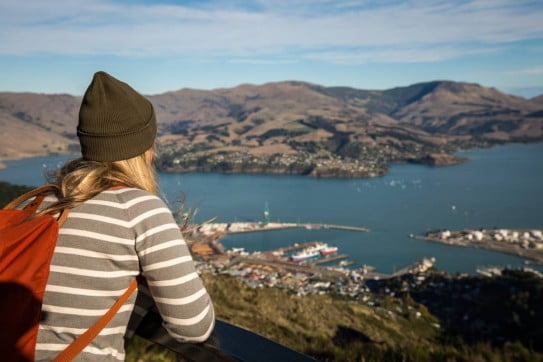 Woman looking out over Lyttelton Harbour. 