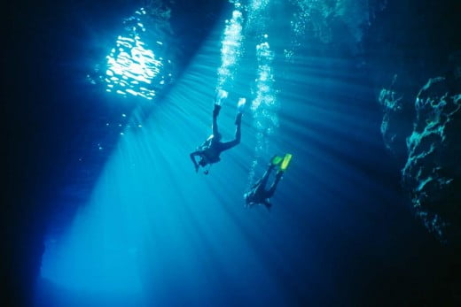 Divers in a cave in Tonga. 