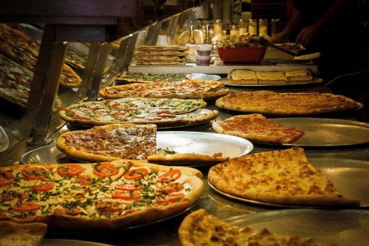 A pizza selection at a pizza restaurant in New York. 