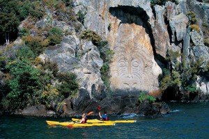 Kayak along Maori Rock Carving at Mine Bay, Lake Taupo, New Zealand