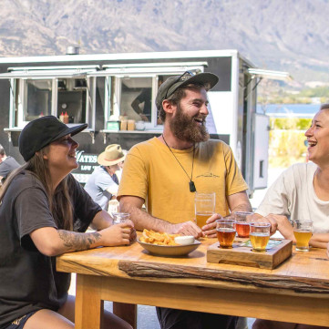 Queenstown Altitude Brewing two couples enjoying food and drinks